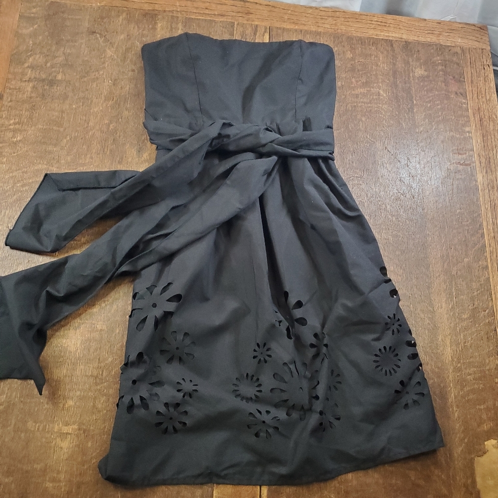 Rhapsody black strapless mini dress with floral cutout design at hemline - Picture 1 of 5